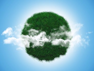 3D render of a grassy globe with clouds