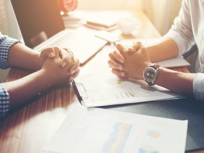 Close-up of  Team Business people discussing a financial plan at office.